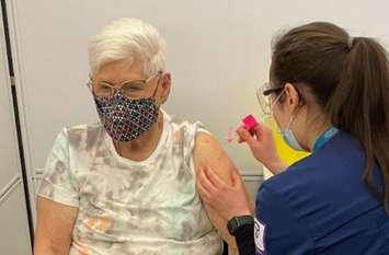 Marion Gillespie receives her first dose of the COVID-19 vaccine. March 15, 2021. (Image supplied by Southwestern Public Health)