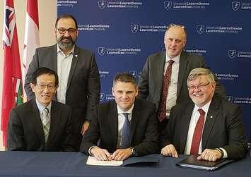 (back left) Glenn Thibeault, Ontario’s Minister of Energy and MPP for Sudbury; and Dr. Pierre Zundel, Interim President and Vice-Chancellor at Laurentian University.   Front left: Dr. Rui Wang, Vice-President Research Laurentian University; James Scongack, Bruce Power’s Vice President, Corporate Affairs & Environment; and Vic Pakalnis, President and CEO MIRARCO Mining Innovation. (photo submitted by Bruce Power)