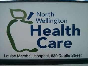 North Wellington Health Care sign outside the Louise Marshall Hospital in Mount Forest, ON (Photo by Craig Power, © May 2016).