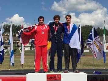 Jeremy Elliot (left) wins silver in hammer throw at the National Youth Track and Field Championships. Photo courtesy of Lucy Elliot. 