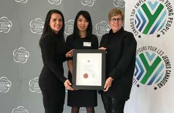 Cathy Sprague, Executive Vice-President, Human Resources (right), and Natalie Manzarpour, Trading Analyst (left), received a plaque from Mediacorp Senior Editor Kristina Leung on Friday (Jan. 17) recognizing Bruce Power as one of Canada's Top Employers for Young People. (Photo provided by Steve McAllister, Communications Specialist, Corporate Affairs, Bruce Power)