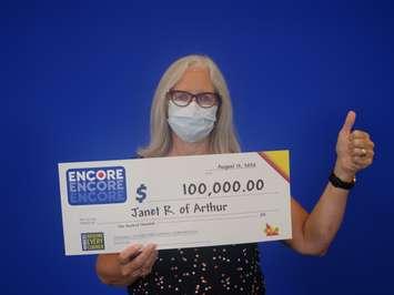 Janet Ritchie of Arthur with her $100,000 cheque for winning the Lotto 649 ENCORE draw. (Photo provided by OLG Media Relations)