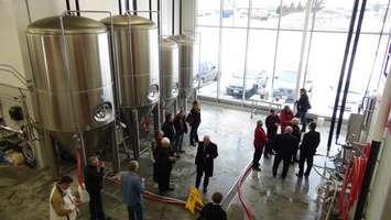 Dignitaries tour the new MacLean's Ales Brewery in Hanover.  Photo by Kirk Scott.