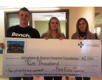 Kyle and Tianna Grant presenting donation to WDH Foundation Coordinator Nicole Jutzi. (photo submitted)