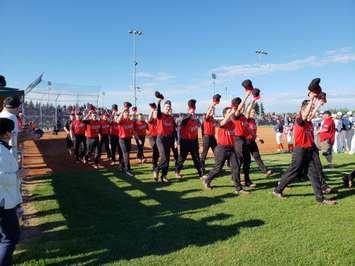 The Canada Jr. Men's Softball team walks out for opening ceremonies at the 2018 WBSC Jr. Men's Softball Worlds in Prince Albert Saskatchewan. July 7th, 2018 (Photo by Steve Sabourin)