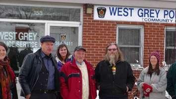 Michael Schmidt (L) along with John Schurr and Robert Pinnell outside the West Grey Police office. 