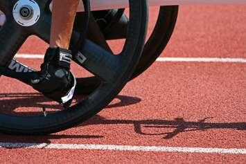 Male athlete prepares for wheelchair race. © Can Stock Photo Inc. / jpavan