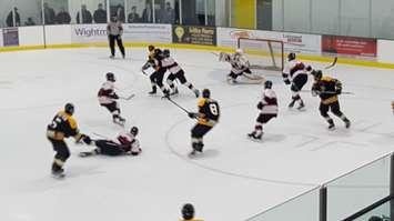 The Listowel Cyclones fend off a Waterloo charge in Game 7 of the 2018 GOJHL Conference Semi-Finals. (Photo by Steve Sabourin)