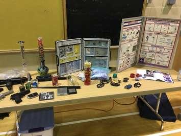 The OPP drug display, from the drug seminar held at F.E. Madill in Wingham. The display featured drug paraphernalia, the drugs themselves, and info on the dangers of those drugs. March 27th, 2017. (Photo by Ryan Drury)