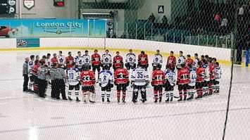 The Listowel Cyclones and the London Nationals remember Humboldt, SK before Game 1 of the Sutherland Cup semi-final in London. (Photo by Steve Sabourin)