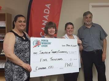 (Left to right) Heather Lorenz, Administrative Coordinator for Saugeen Shores Celebrates Canada’s 150th
Committee;  Linda Crombeen, Power Workers’ Union;  Megan Jackson, Saugeen Shores Chamber of Commerce;  and Neil
Menage, Vice Chair of the Saugeen Shores Celebrates Canada 150th Committee. (photo sumitted)
