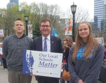 MPP Bill Walker joined local students Malcolm and Tess Bainborough on the southgrounds at Queen’s Park where they rallied against school closures.