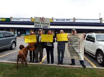 Protesters voice concerns over the government deal to buy the Tans Mountain Pipeline in B.C. outside of Huron-Bruce MP Ben Lobb's Office in Goderich. (Photo by Bob Montgomery)