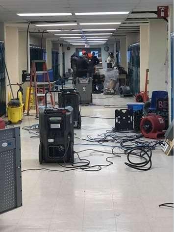 A hallway at Highpoint Community School showing fans and dehumidifiers being used following flooding from a burst water pipe (Photo from Highpoint Community School's Facebook Page)