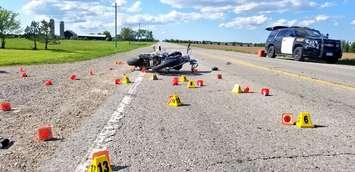 Police investigate a collision involving a motorcycle on Wellington County Road 14 near Arthur, June 6, 2019. (Photo courtesy of the OPP via Twitter)