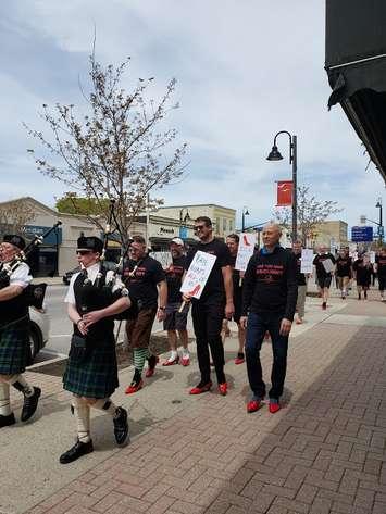 Participants for the "Walk A Mile In Her Shoes" event in downtown Port Elgin, all in support of Women's House Serving Grey and Bruce. May 26th, 2019 (Photo provided by Michelle Lamont, Community Funds and Development Coordinator, Women's House)