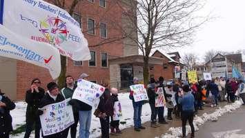 Protesters angry with the cuts to autism funding for children demonstrate in front of MPP Bill Walker's office in Owen Sound. April 2nd, 2019 (Photo by Kirk Scott)