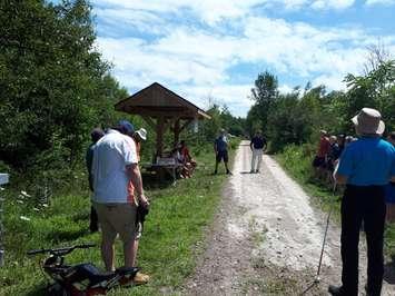 Volunteers lay stone dust on the G2G trail in July of 2020. (Photo by Bob Montgomery)