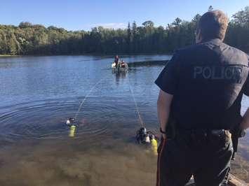 Police search a lake in Normanby Township for a man who went missing while canoeing, August 14, 2019. (Photo courtesy of the West Grey Police Service)