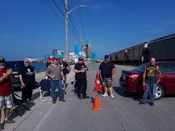Members of Unifor 16-O block the road leading to the salt mine in Goderich. Members have been on strike since April 27th. (Photo by Bob Montgomery)