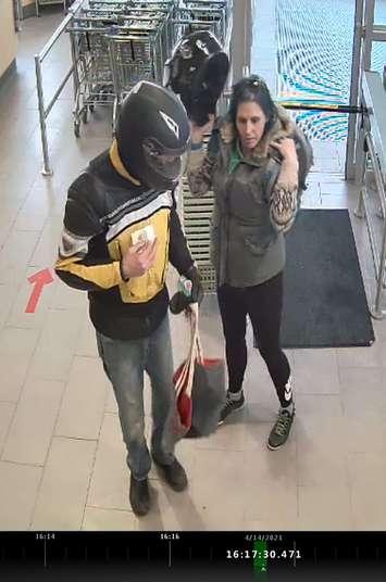 Police are looking for any leads regarding these two suspects who allegedly stole $120 worth of alcohol from a local Mitchell Road business in Perth County. (Provided by Perth County OPP)