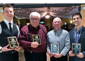 (L-R) Mount Forest Young Citizen of the Year Corbin Peters;  Mount Forest Citizen of the Year Klaus Seibert;  Arny Feairs Customer Service Award Ernie Hunter of Meat the Butcher;  and Corporate Citizen of the Year Luciano Amico of Canadian Tire. (photo by Campbell Cork)