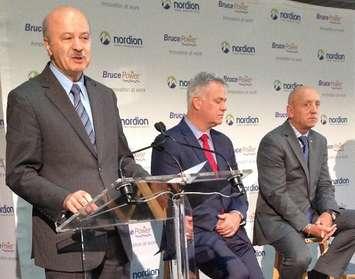 Ontario's Minister of Research and Innovation Reza Moridi (standing) helped announce a new agreement between Bruce Power and Nordion that will secure the long-term supply of Cobalt-60, which can be used to treat people with cancer.
(Photo submitted)