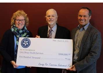 Endowment donor Thomas Foster (centre)  presents $500,000 for medical equipment and staff training to GBHS Interim President & CEO, Maureen Solecki (left) and Chief of Medical Staff Dr. Mike Marriott (right).  The funds were earned in the Foundation’s endowment during 2018.  (photo submitted) 
