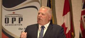 Ontario Premier Doug Ford speaking at the Ontario Provincial Police Annual General Meeting at Blue Mountain Village on Tuesday (Photo by Adam Bell)