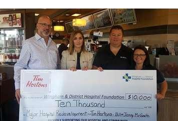 (right to left) Mark Foxton, Fundraising Committee Chair; Nicole Jutzi, WDH Foundation Coordinator, Bill McGrath and Jenny McGrath, owners of Tim Hortons. (photo submitted) 
