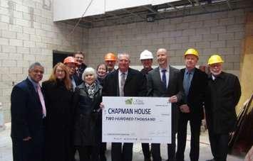Grey County councillors present cheque to Chapman House officials. (photo by Kirk Scott)