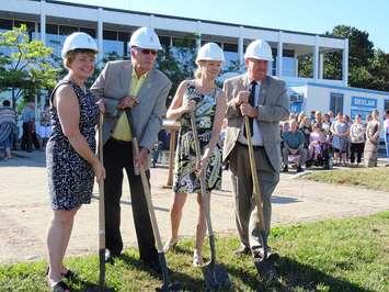 Photo: Kim Wingrove (left) Dwight Burley, Anne Marie Shaw, and Warden Alan Barfoot take the ceremonial first shovel at the groundbreaking ceremony for the Grey County Administration Building Addition.