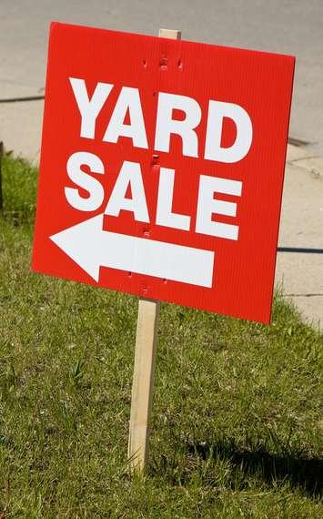Yard sale sign. © Can Stock Photo / bradcalkins