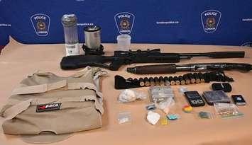 Guns and various drugs seized at a home in the area of Pond Mills Road and Commissioners Road East, February 14, 2024. Photo provided by London police
