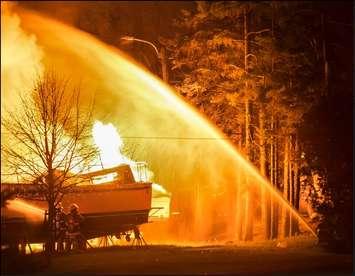 Seven boats are engulfed in flames following an explosion and fire at Port Elgin Harbour, October 27th, 2015. Photo courtesy of Michael Johnson. http://creativephotosbymike.zenfolio.com