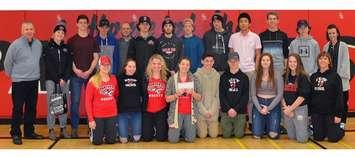 The South Huron District High School Athletic Council and students present a cheque to the Jones Bridge Committee (photo submitted)
