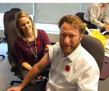 The Municipality of Bluewater's outgoing mayor Tyler Hessel getting his flu shot (photo submitted)