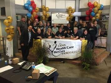 The staff and hosts of the 2016 CKNX Healthcare Heroes Radiothon, with a 5 o'clock pm total at $247,822. 
