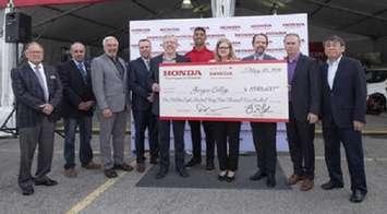 Honda of Canada Mfg. and the Honda Canada Foundation announced a $1.8 million donation in cash and in-kind to Georgian College on May 30th.  MaryLynn West-Moynes, President and CEO, Georgian College and Tom Lake (pictured two left of West-Moynes), Executive Vice President, Honda of Canada Mfg. and Vice Chair, Honda Canada Foundation, were joined by representatives from the Honda Canada Foundation, Georgian College Board of Governors, County of Simcoe and City of Barrie. (CNW Group/Honda Canada Inc.)