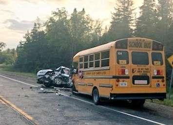 Emergency crews responded to a head-on crash between a car and a school bus on Wellington County Road 124 in Erin, August 15, 2019. (Photo courtesy of the OPP)