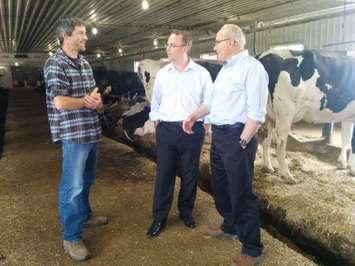 Dwayne Koeslag (left) with Stephen McCotter (centre), Perth-Wellington Liberal candidate, and Wayne Easter at Wilko Farms just east of Clifford. (Submitted photo)